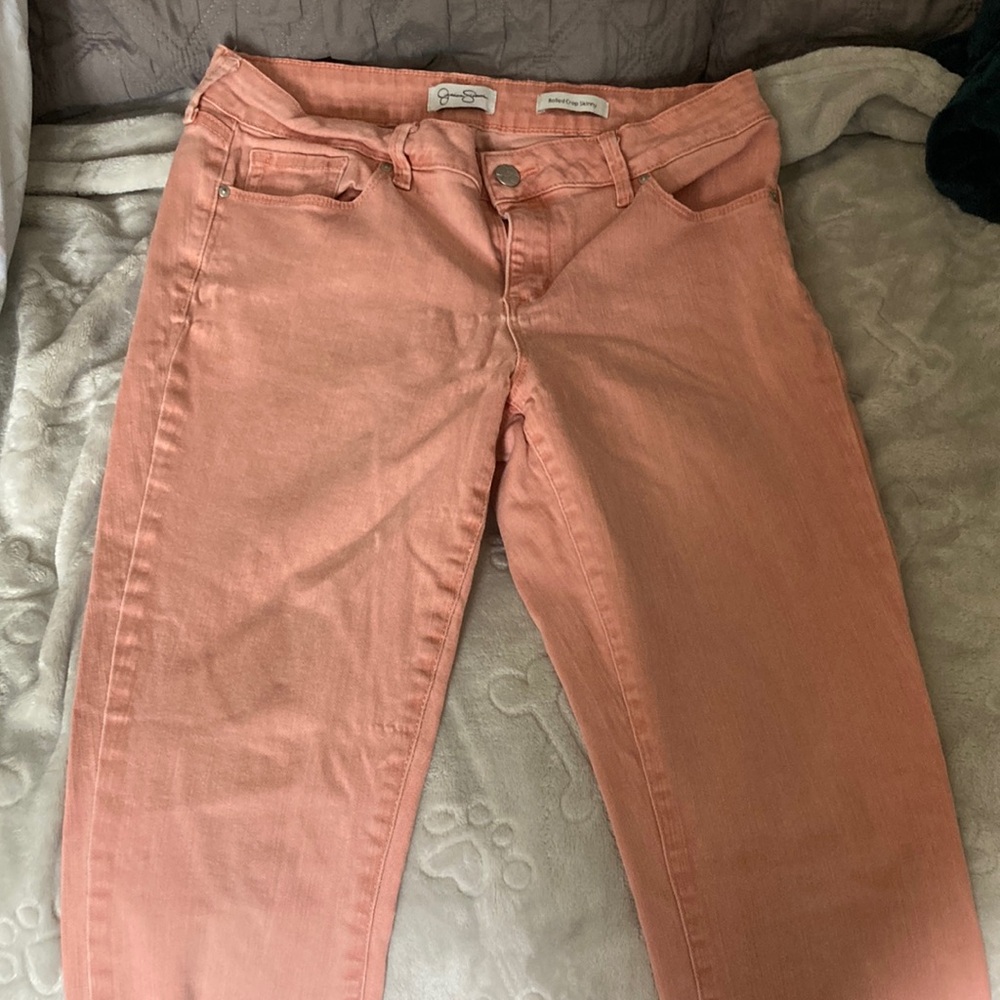 Salmon colored stretchy jeans